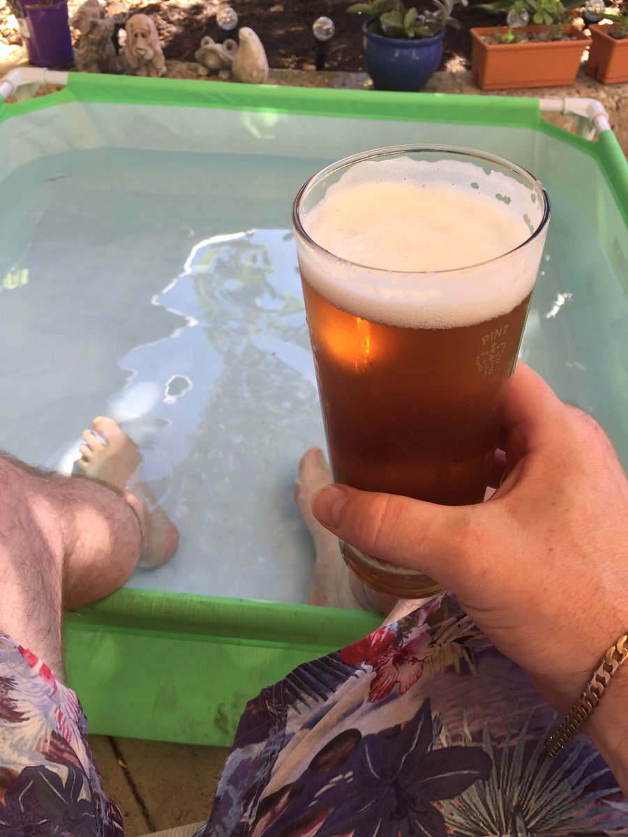 Beating the Perth heat with a cold #homebrew helles and the feet in the kids wading pool