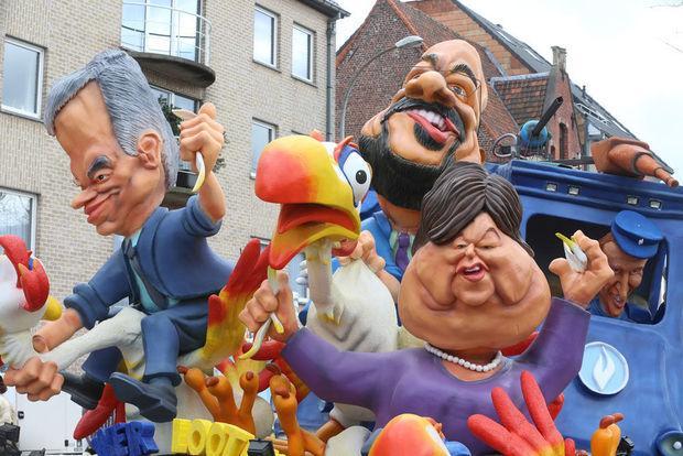 Knack's tweet photo. Carnaval Aalst: 'Humor als overlevingsmiddel in tijden van cynische graaiers en toenemende ongelijkheid' https://t.co/uuSG81Lbhu https://t.co/o4EmghQ0lz