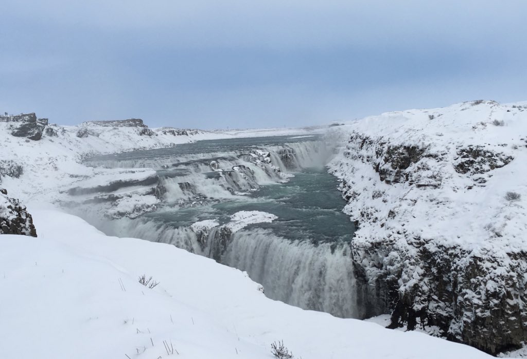 Gullfoss waterfall, large powerful river guching waterfall over cliff