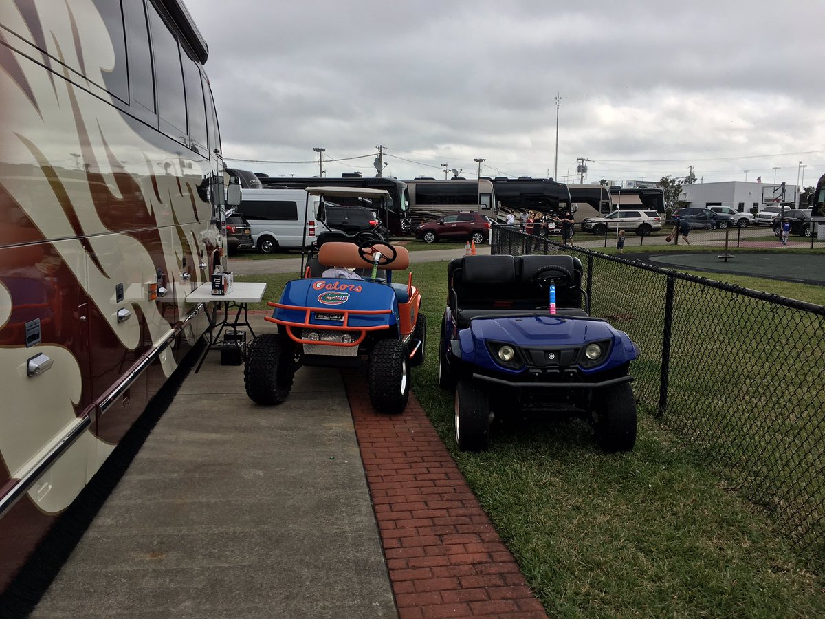 DaleJr's tweet photo. Wanna make a complaint to the HAO. These nuts rentin @TonyStewart old bus got the fence to the kids playground all congested. #CleanUpYoMess https://t.co/9c1fxYi1YP