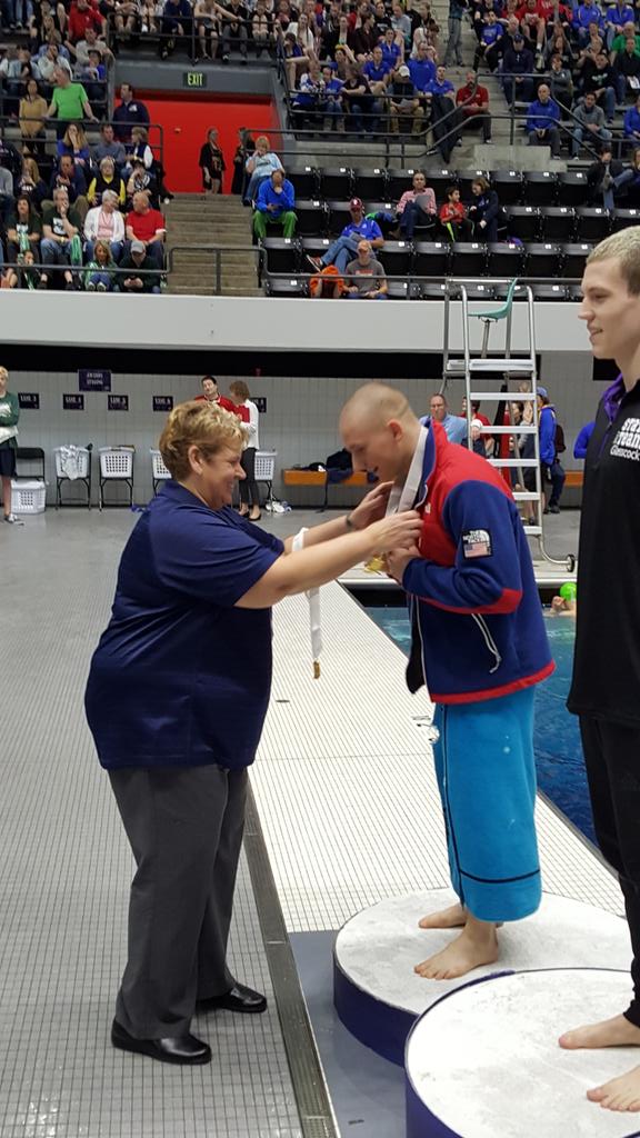 Neidig's tweet photo. I spy @rdpathletics Athletic Director extraordinaire Patty McCormack handing out awards at the @IHSAA1 boys state swim meet. #amazingAD https://t.co/WeLsjrk3sh