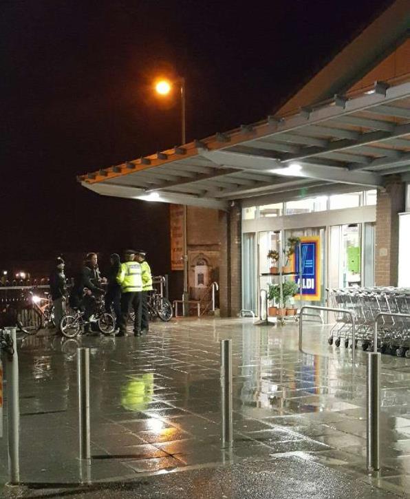 wiltspolicesc's tweet photo. A bit of community engagement in Trowbridge, stopped for a quick chat in the rain with some young people #WPSpecials #OPDrogo #Community https://t.co/JNe3KGHKgy