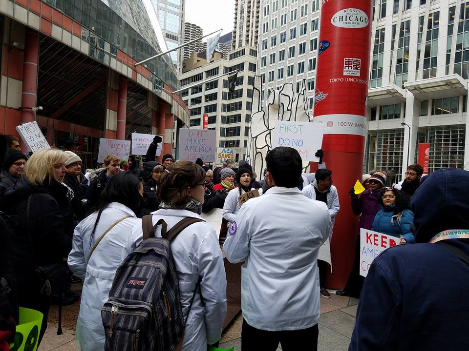 victorroy's tweet photo. standing up to #ProtectOurCare in chicago #HealthProfessionalsProtest @AndrewMakeTweet https://t.co/cSnLBsd6qU