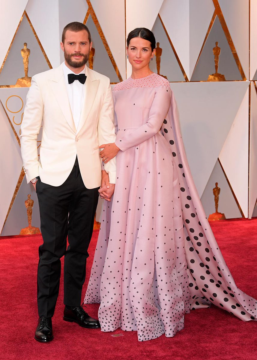 RedMagDaily's tweet photo. Mr. Grey, sorry Jamie Dornan, and his wife have arrived #Oscars https://t.co/JAdiMeLF3H https://t.co/LJKoED9X9z