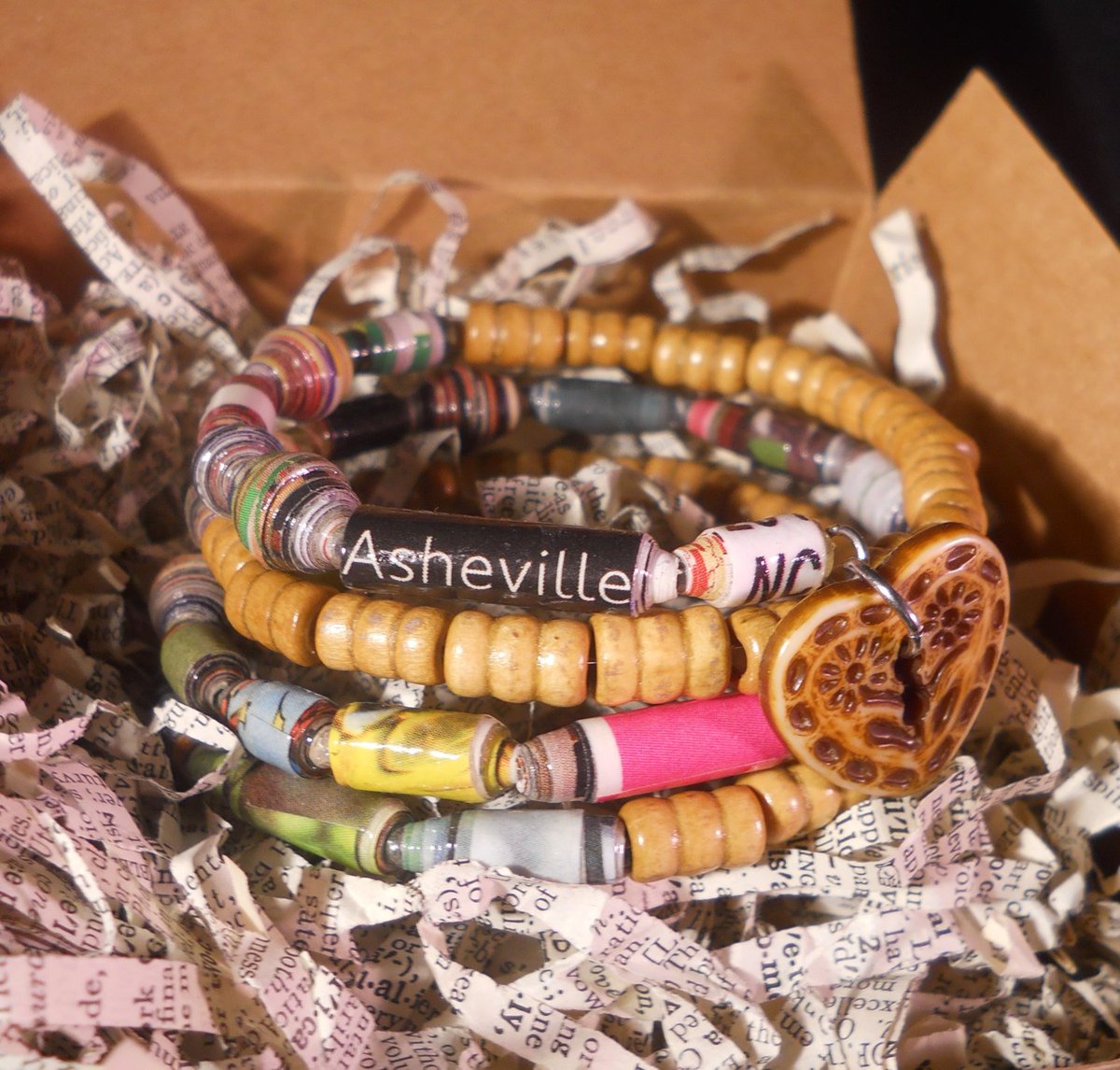 FoodieScapes's tweet photo. Asheville, NC Recycled Paper Bead Boho Memory Wire Bracelet https://t.co/iRdeGjGY4z #upcyled #MapBracelet https://t.co/Dl4Hq9TyyT