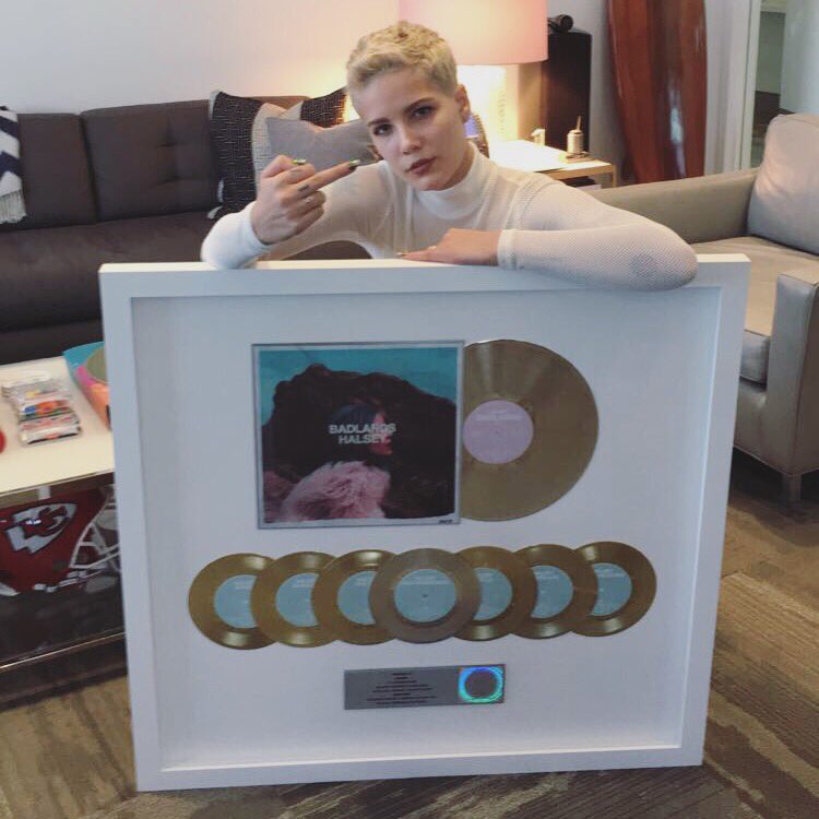 halsey's tweet image. fuck a vacay, I feel better @ work