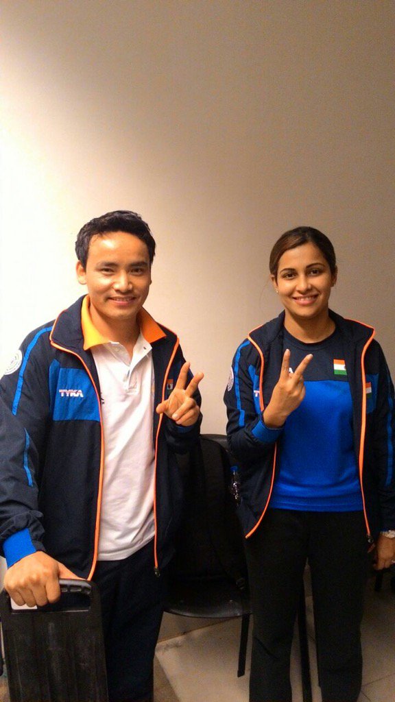 virenrasquinha's tweet photo. So proud to support these two shooting stars @OGQ_India . GOLD!! Well done @JituRai @HeenaSidhu10 https://t.co/Uqqx48jUVZ