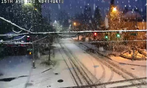 seattledot's tweet image. Snow sticking in many parts of #Seattle and still coming down hard. Please travel safely in these winter weather conditions.