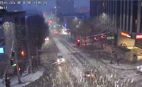 seattledot's tweet image. Snow sticking in many parts of #Seattle and still coming down hard. Please travel safely in these winter weather conditions.