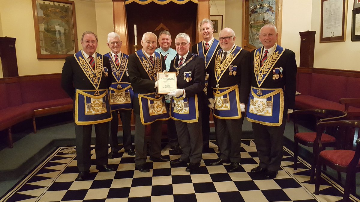 WBro Dave Perkis APGM presenting WBro George Davis with his 50th year in Freemasonry Certificate at West Wight Lodge this evening 27 Feb.