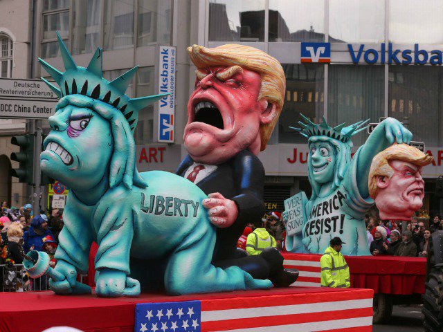 2oceansvibe's tweet photo. German Carnival Shows Trump Zero Mercy With Their 'Rosenmontag' Parade [Images] https://t.co/5HKh9ItNft https://t.co/wZlJjGvEY0