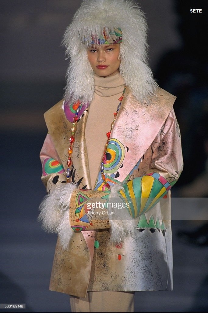 A model walks in the Louis Feraud Spring 1999 Couture Runway Show