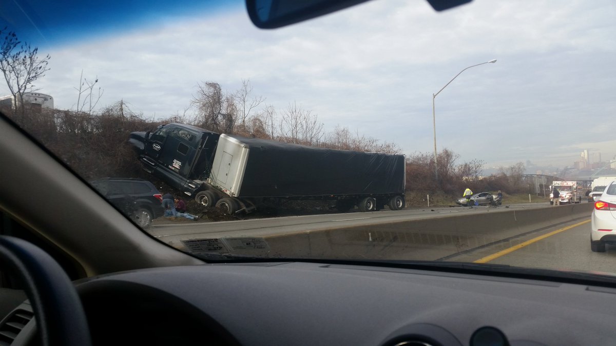 Kovy668's tweet photo. @WPXITraffic Woman and baby in car seat on the side of the road I'm assuming were in the small car. Both are awake https://t.co/N84DnBQ96C