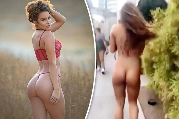 Fitness babe Sommer Ray takes a walk in mind-bending flesh coloured swimsui...