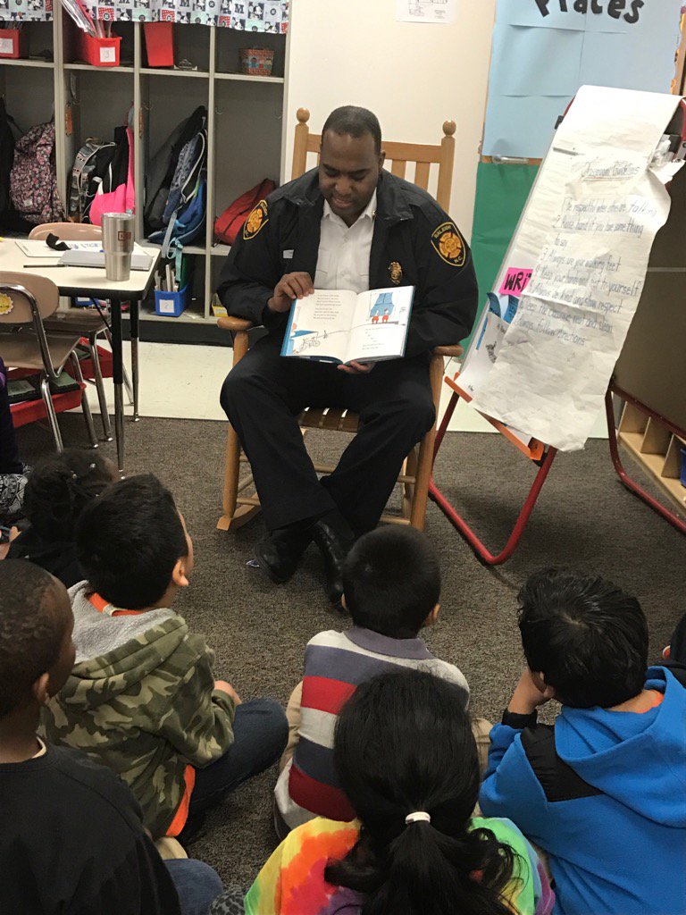 One of our local firefighters reads to our 2nd graders! @wilburn_es