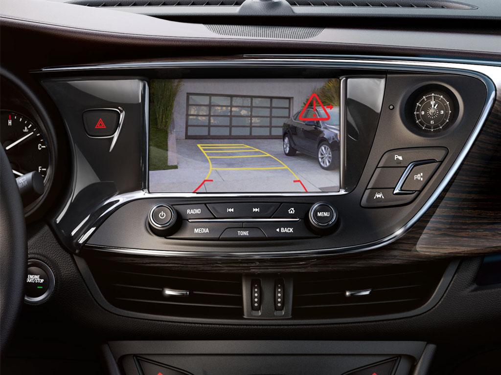 Buick's tweet image. Show those tough spots who’s boss. Available Automatic Park Assist. The new #BuickEnvision. bit.ly/2lSVHHb