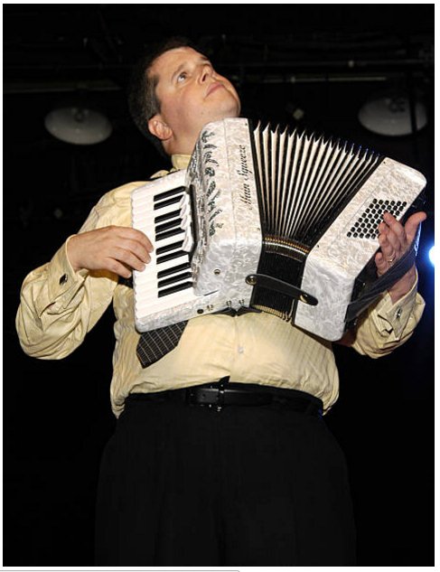 Happy birthday Daniel Handler.
Playing the accordion in A Grim Evening With Lemony Snicket
Photo: Shawn Ehlers 