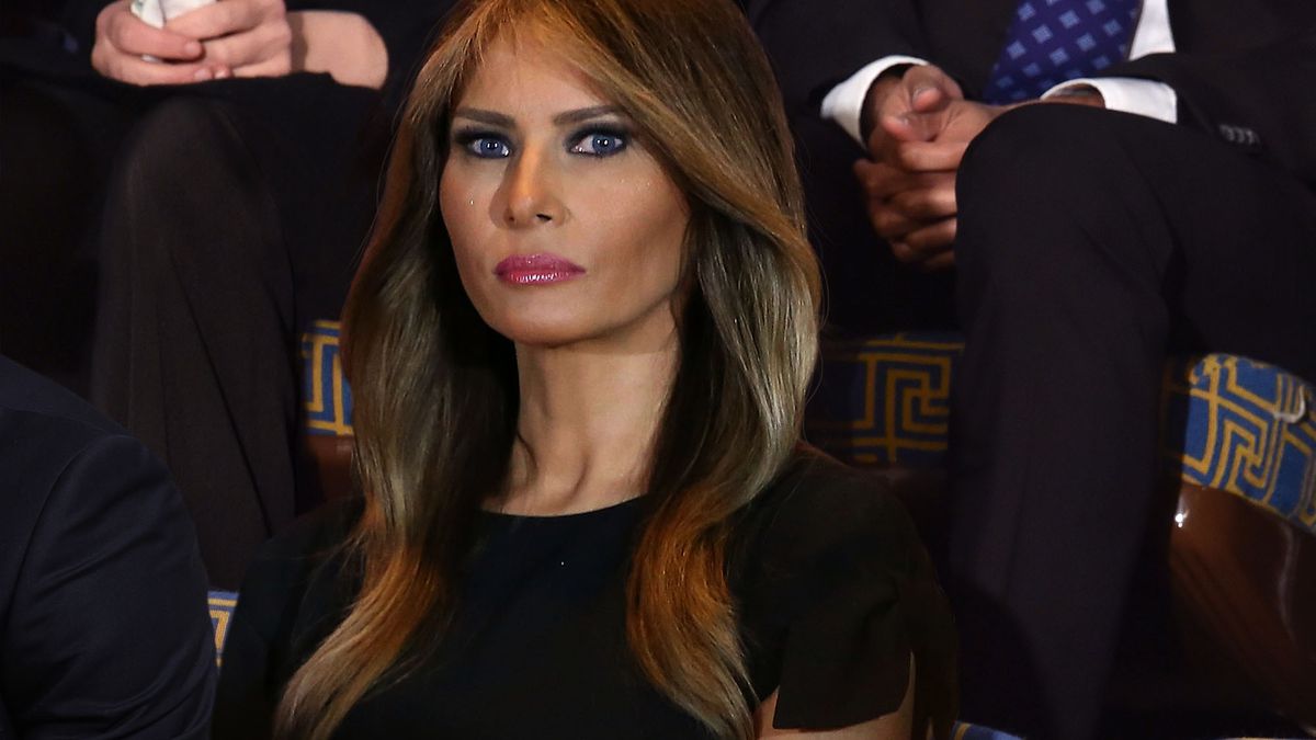 TheOnion's tweet image. Melania Trump Looks Down On Husband From Gallery With Loving Grimace trib.al/1iUyQGn