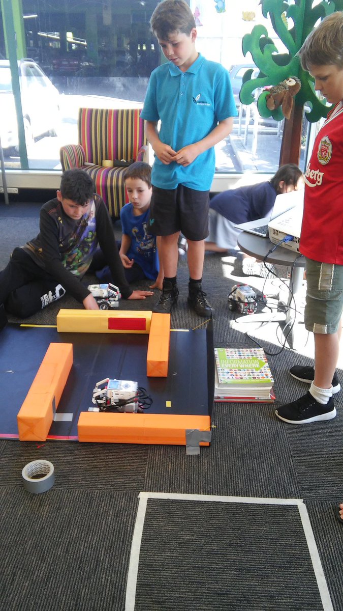 Librarianforu's tweet photo. Roboclub at #shirleylibrary. Using touch sensors to drive a Robot around a course. Lots of competitive &amp; exciting action! @ChristchurchLib https://t.co/iuLX2DqQic