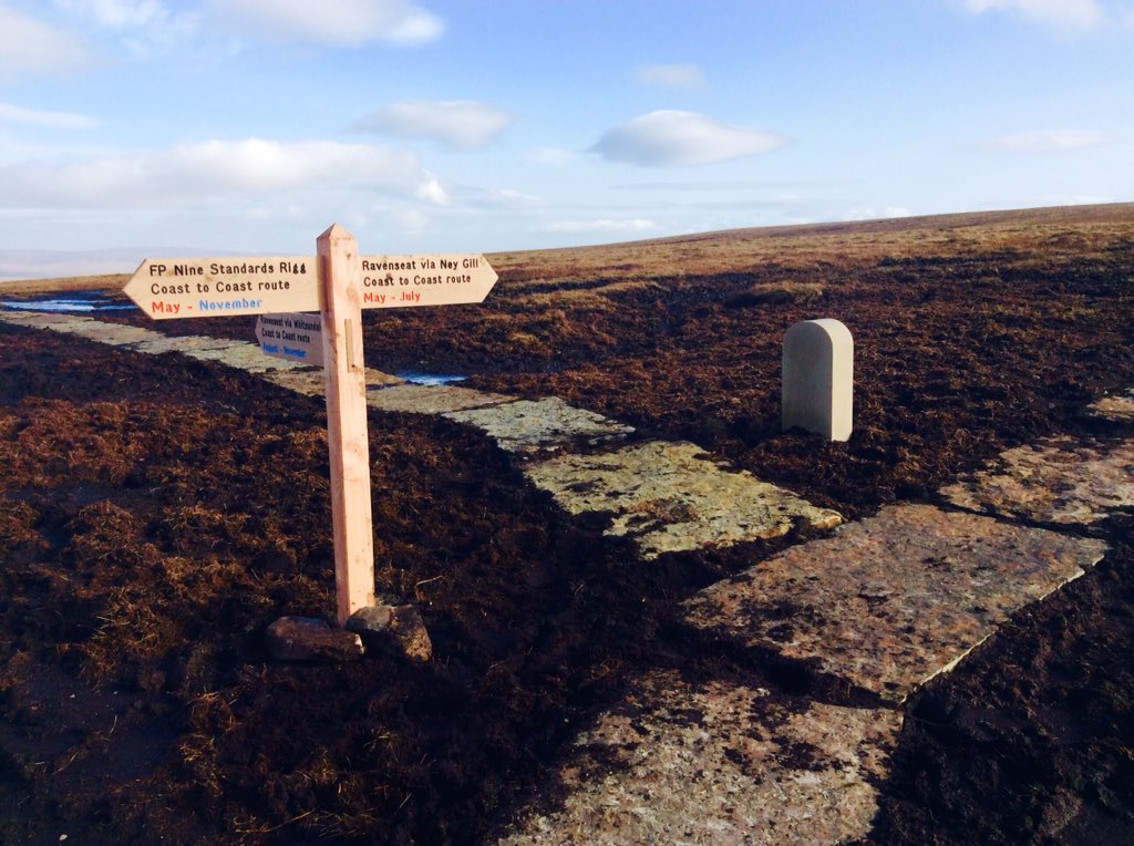 Dalesranger's tweet photo. Every #ranger has his cross to bear! New fingerpost on #coasttocoast Nine Standards Rigg at restoration site. @NorthPennAONB @Team_BMC https://t.co/2icZVN8cGW