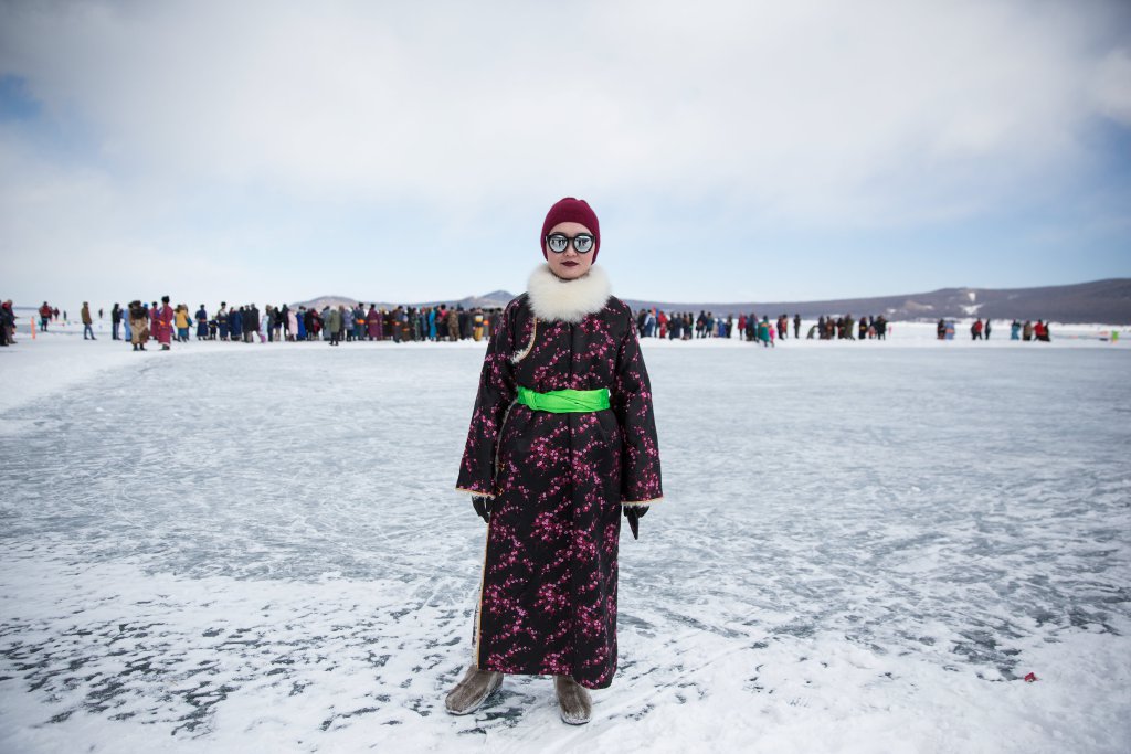 wwd's tweet photo. Mongolians decked out in their best clothing for the annual Ice Festival: https://t.co/k8MS2OLbPy https://t.co/eii1ceeXIs