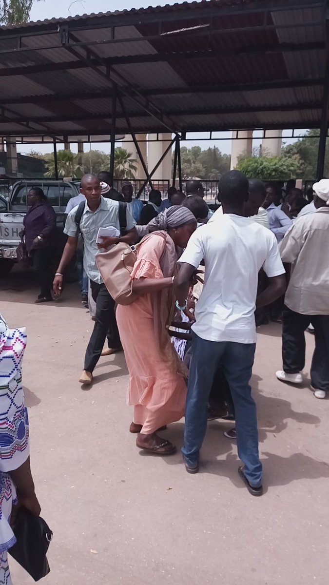 freejobe39's tweet photo. Heavy confrontation at High Court in Banjul b/w families of murdered Solo #Sandeng &amp; of accused ex-NIA officers accused of to the murder https://t.co/JtakqKtPCH
