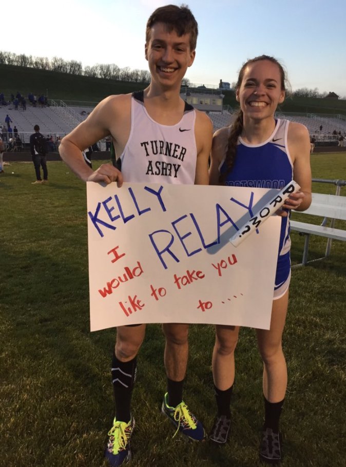 He asked her to prom with the relay baton!!