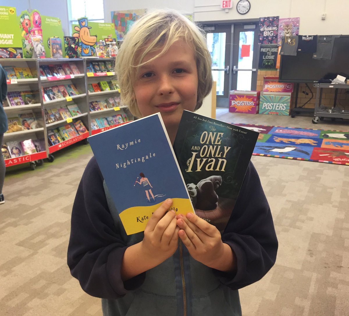 LauraRHartley's tweet photo. Telling his parents about @MrSchuReads visit, he mentions that Mr. Schu is now one of his heroes. And these are the books he bought. ❤️❤️ https://t.co/Tl660XwWX7