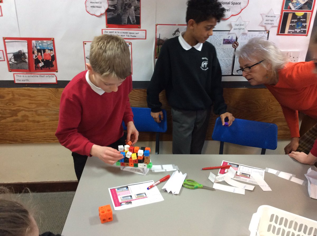 WooldaleJ4B's tweet photo. #WJSscienceweek bridge building in year5. 50 cubes supported by 1 arch and 1 span. Great engineering https://t.co/8YySOQ3Ex1