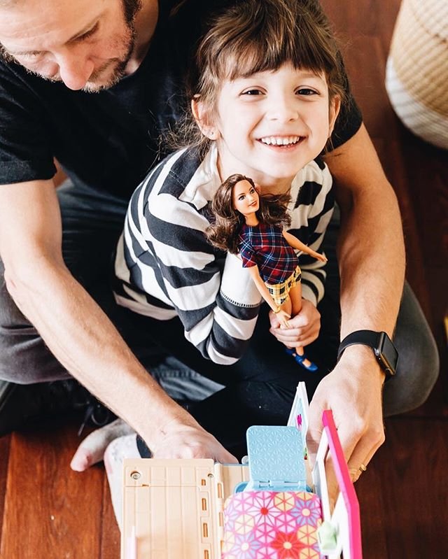 Barbie's tweet image. Iris shows her dad the best way to play out Barbie stories. Little does she know, dad has some silly ideas up his sleeve! #DadsWhoPlayBarbie
