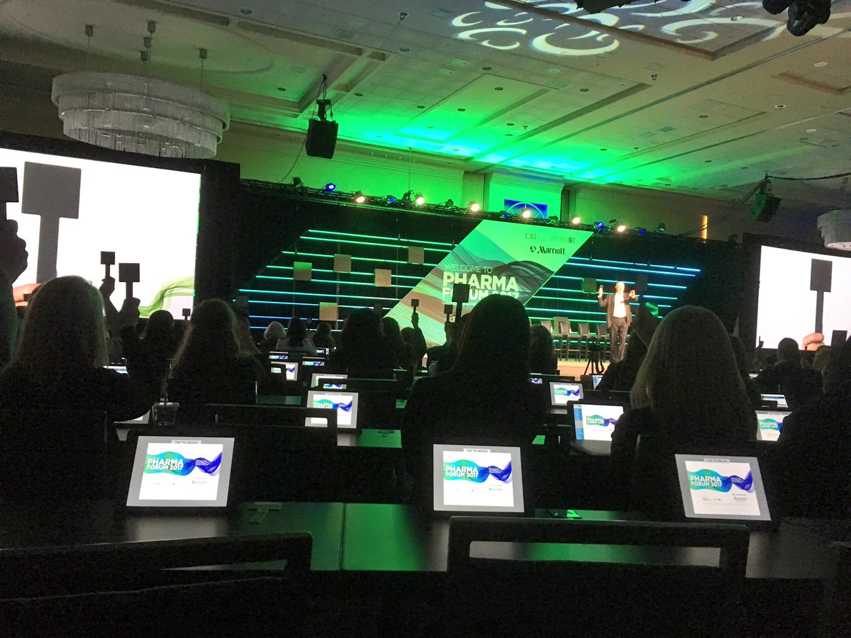 corimari3's tweet photo. Paddles up! @SwarmWorks bringing so much energy and excitement to general session this morning at @PharmaForum_CBI! #phrmforum https://t.co/cUlh8CfWWc