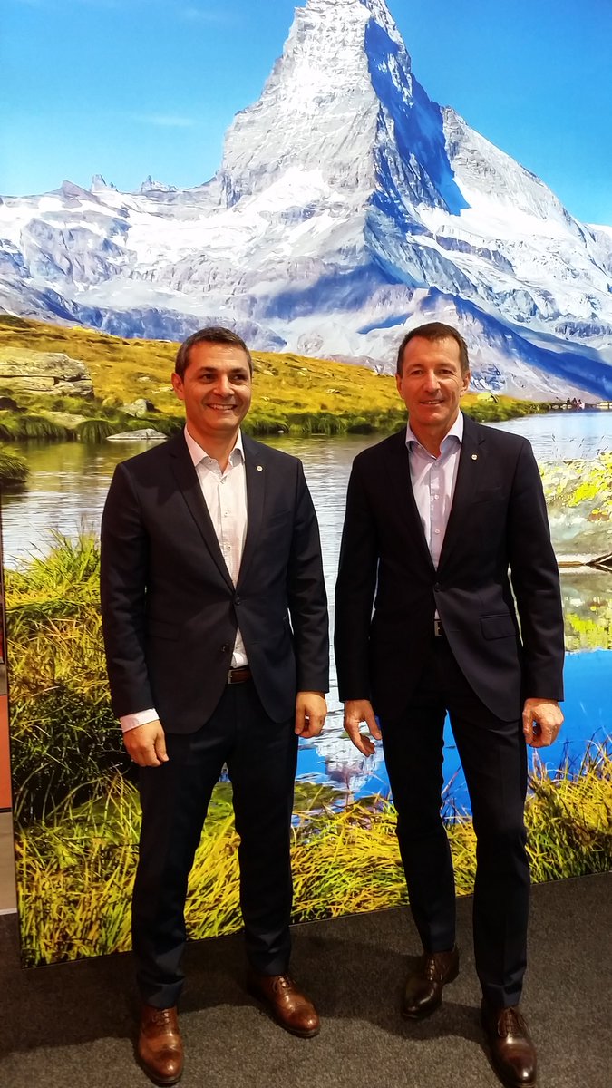 materialfluss's tweet photo. Kurzer Abstecher ans Matterhorn. Am Stand von #Ferag CEO Jürg Möckli (rechts) und Verkaufsdirektor Enrico Caruso. #LogiMAT https://t.co/L1xkScjMkz