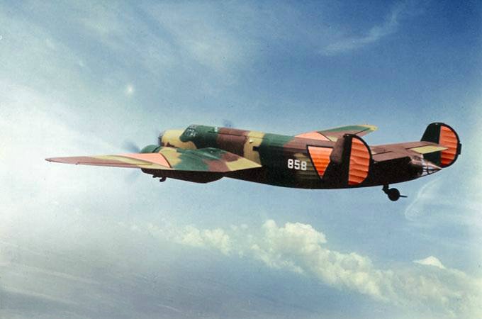 Dutch Fokker T. V twin-engine bomber with unique tricolour camo scheme and bright orange identification markings used by Dutch Air Force at the onset of WW2.