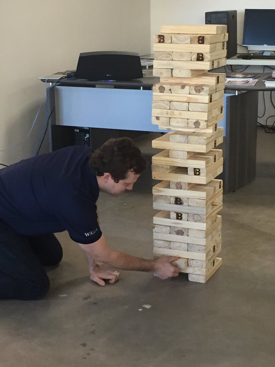 BarkrStructural's tweet photo. This is what happens when you visit us at our office... you must take a turn! Good job #WGA #GiantJenga https://t.co/OBNkKghPic