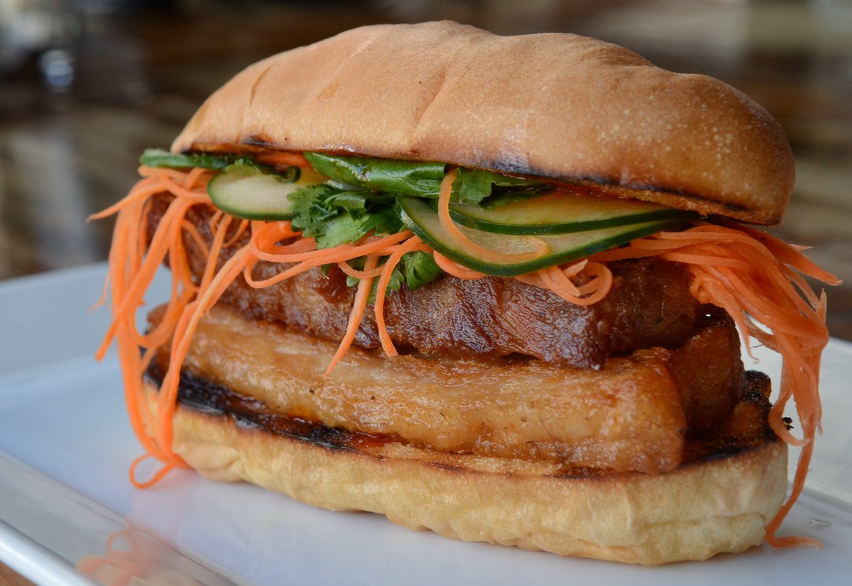 Presenting, the happy hour "Pork Belly Banh Mi" with pickled carrots and cilantro.  $5 from 5:00-7:00pm, Monday - Friday.