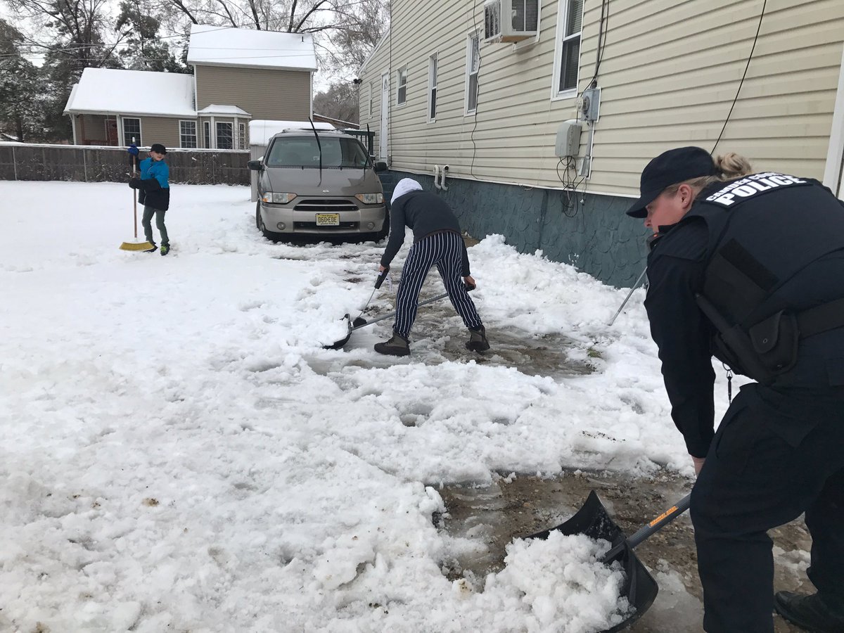 Officers Suheily Lopez and Ashley Williams helping out with snow shoveling in Cramer Hill! #operationguardian