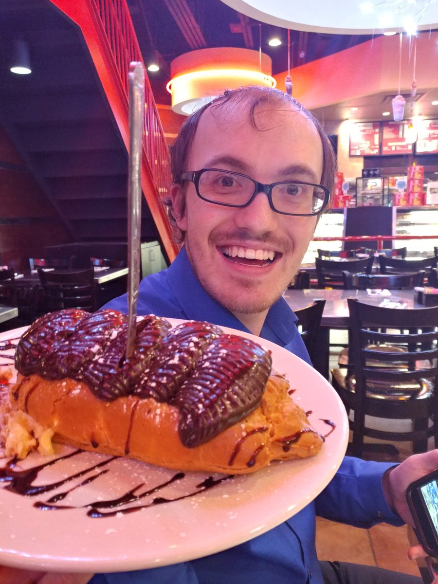 hgrybas's tweet photo. This is the biggest eclair I have ever seen/eaten. You can get them at Vaccaro's bakery here in baltimore! #igtf2017 https://t.co/oQEqhdCJsL