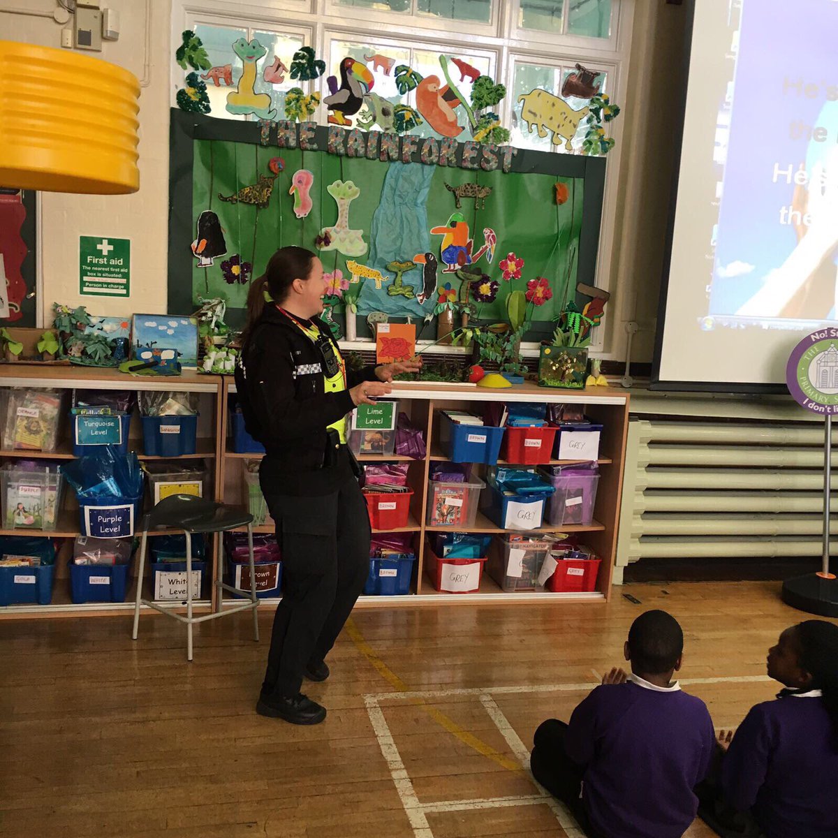 SmethwickWMP's tweet photo. PC Darby doing a PREVENT assembly at Cape Primary School #capeprimary @ShirelandHall @VicParkAcademy @ShirelandCA @UplandsManor @BPSandwell https://t.co/vO5ISwI1LL