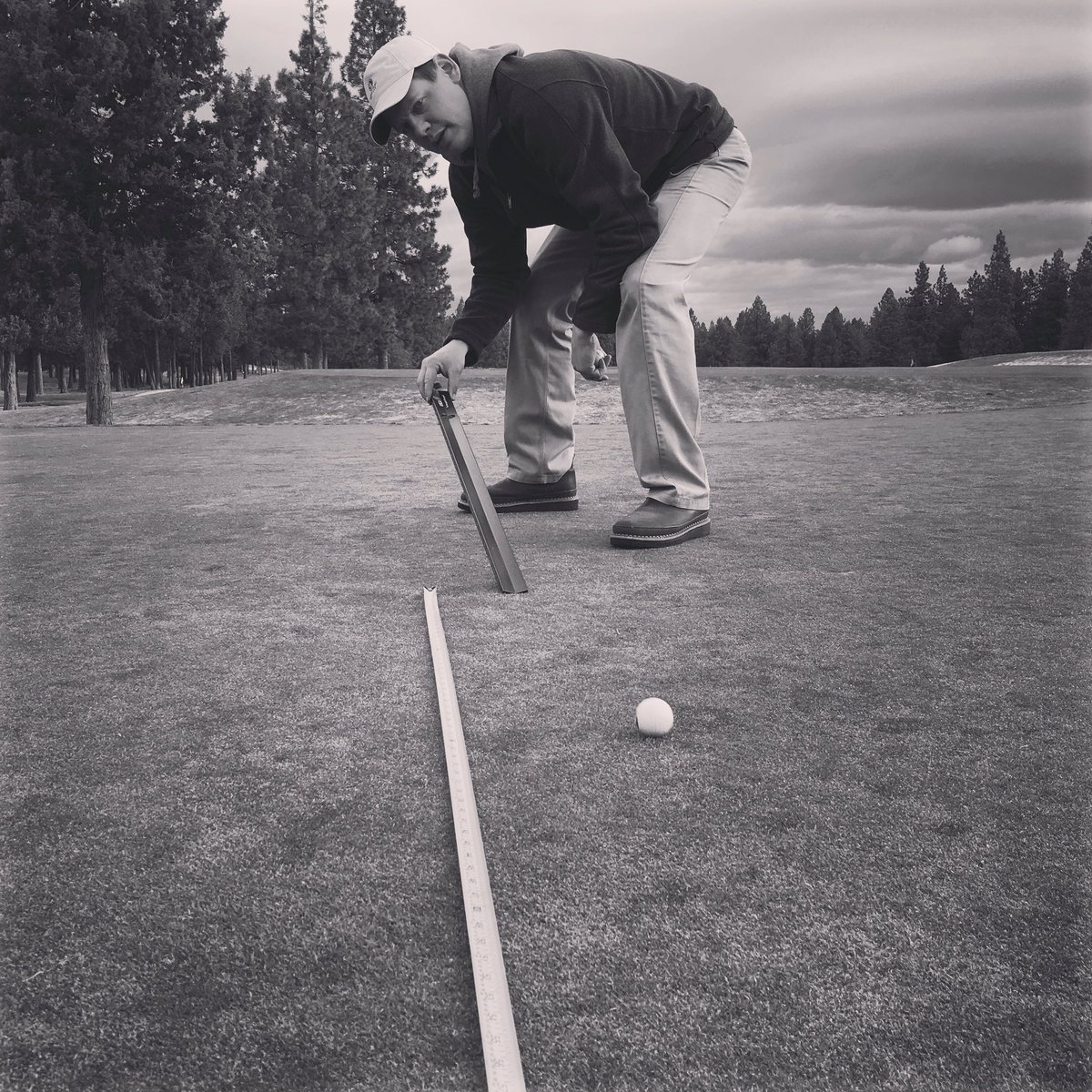 Our superintendent checking green speeds using the stimpmeter. Our practice putting green opens today!