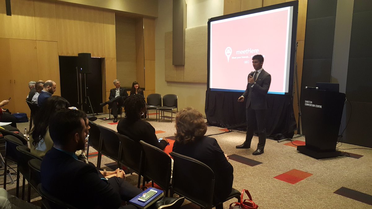 CharlesTheWhat's tweet photo. @meetHereapp rocking out his presentation. Perhaps when I grow up I can present as good as him 😉 #startuphuddle #GEC2017 https://t.co/nopiv3gSa8