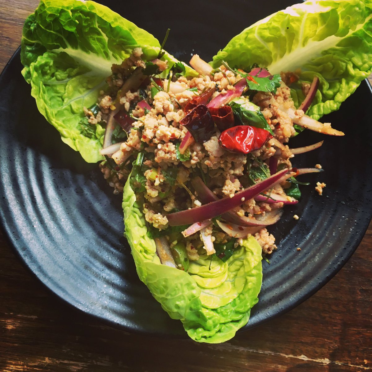 phranakhonuk's tweet photo. Fancy having your salad elevated to another level? Check out Laab Moo, delicate minced pork served on a bed of crunchy lettuce. #thai #york https://t.co/CZjN52YWVo