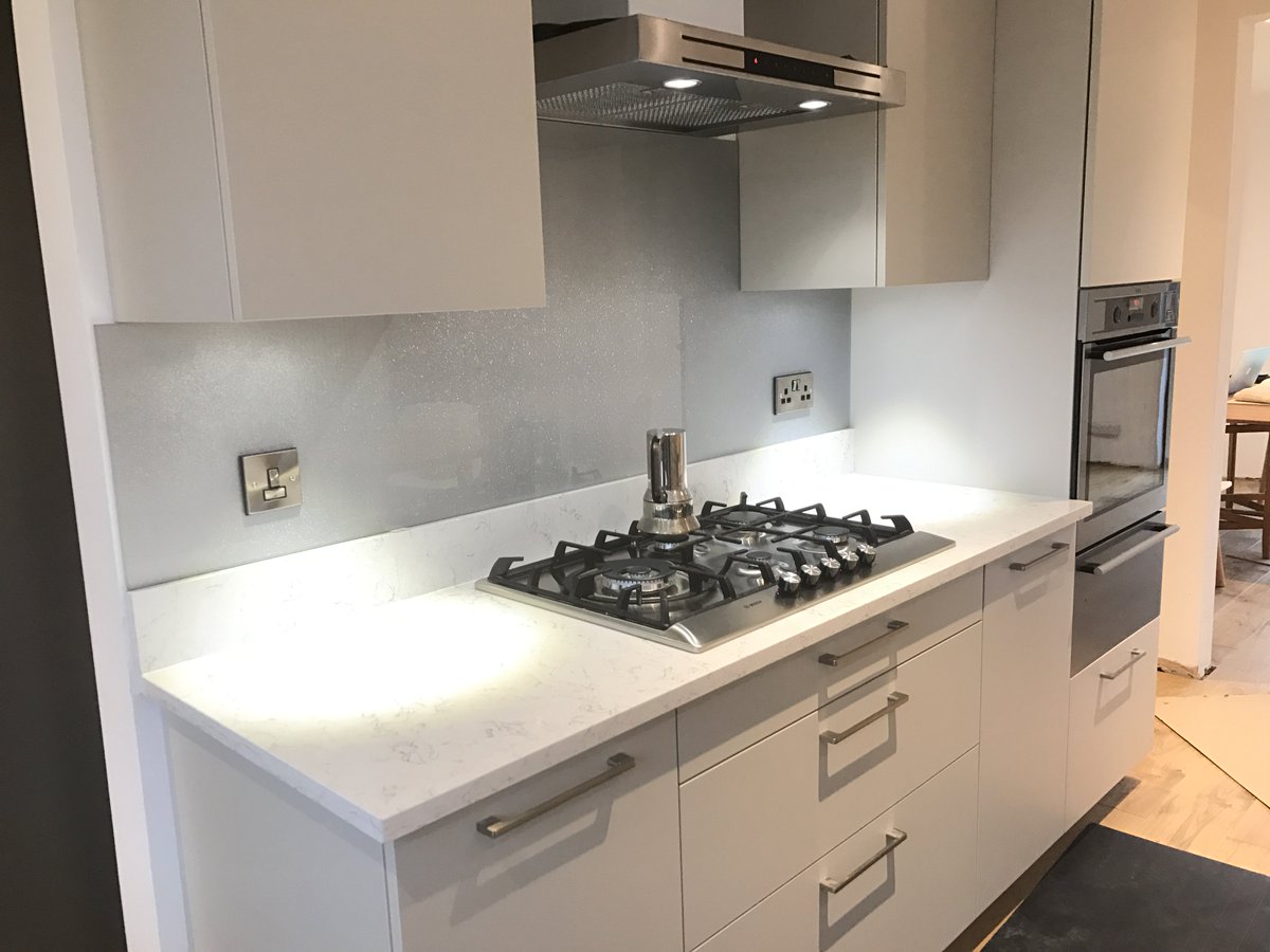 kitchensinbath's tweet photo. Sneak pictures of a Kitchen almost finished in Wells. Bespoke curved unit for a round table to be placed there, Silestone tops &amp; wood floor https://t.co/gVAoEE9Wya
