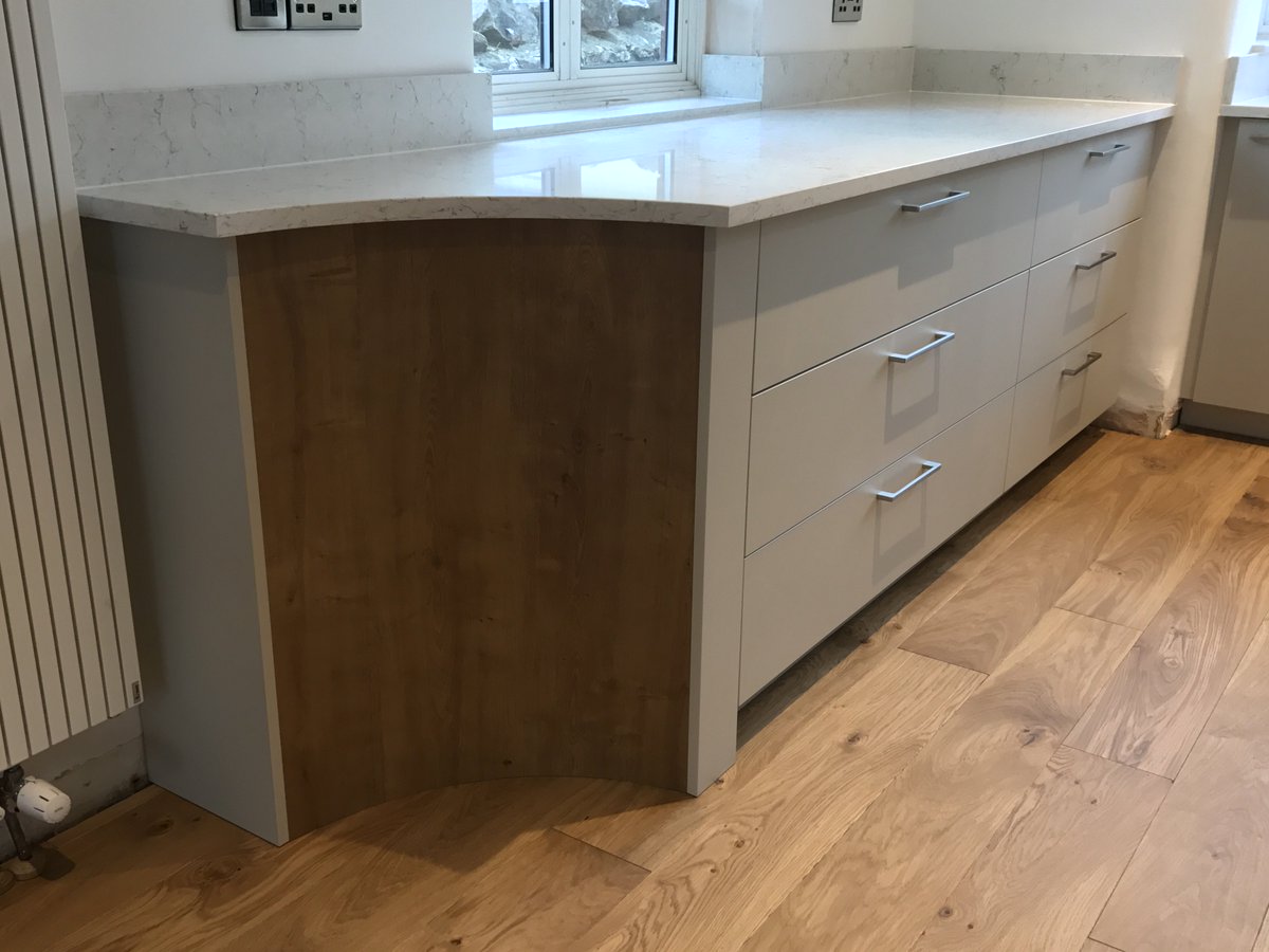 kitchensinbath's tweet photo. Sneak pictures of a Kitchen almost finished in Wells. Bespoke curved unit for a round table to be placed there, Silestone tops &amp; wood floor https://t.co/gVAoEE9Wya