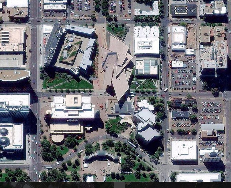 GutterScope's tweet image. We&apos;re checking out the Denver Art Museum this #wayupwednesday and the 9,000 titanium panels reflecting the Colorado sunshine! 📷 DigitalGlobe