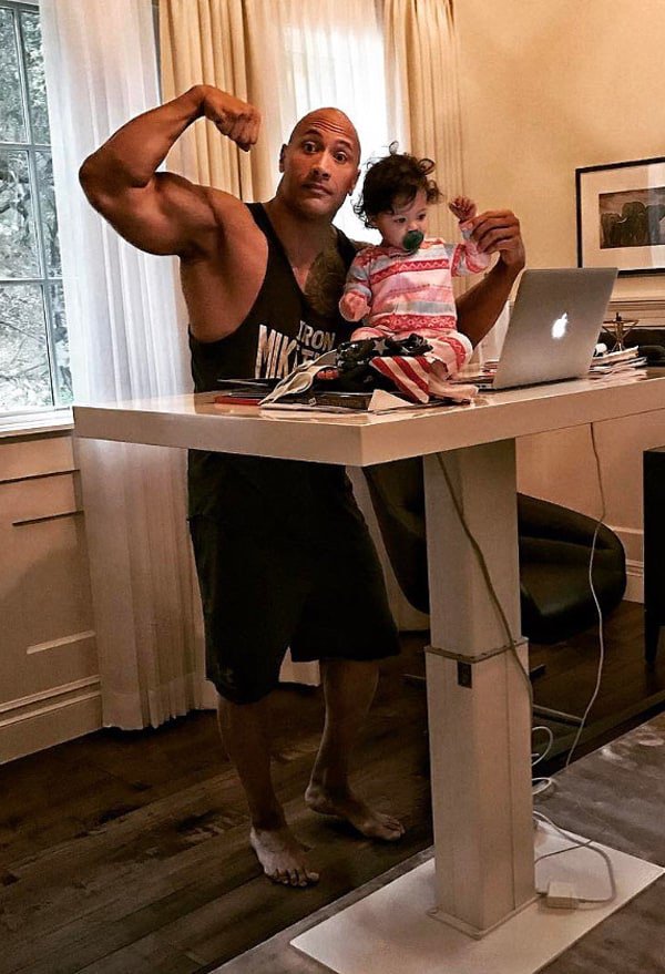 AngMacdonaldDC's tweet photo. "Rocking" his standing desk. Ever thought of one? We were not created to sit all day. #postureproject https://t.co/xPskwmHqkL
