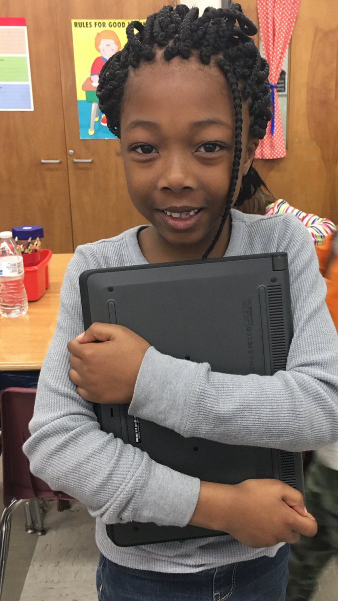 KymHarjes's tweet image. Practicing the &quot;hug&quot; for safely carrying our chrome books #chromebooks #techimmersion