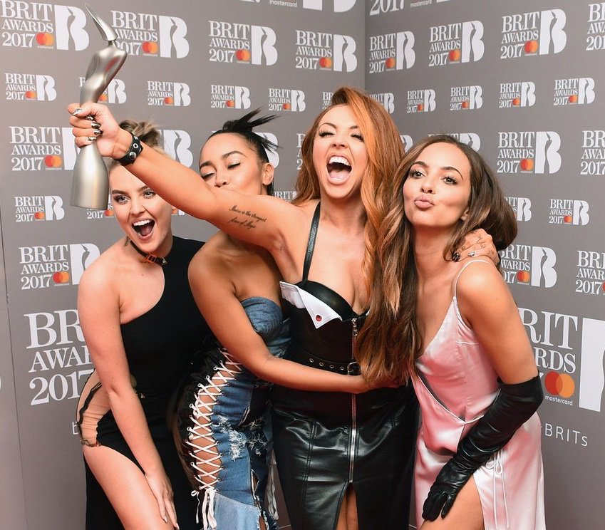LittleMix's tweet photo. Still 👏 cannot 👏 believe 👏 it 👏WE WON A BRIT! 😂💕 xx the girls xx https://t.co/z0hlG71J9a