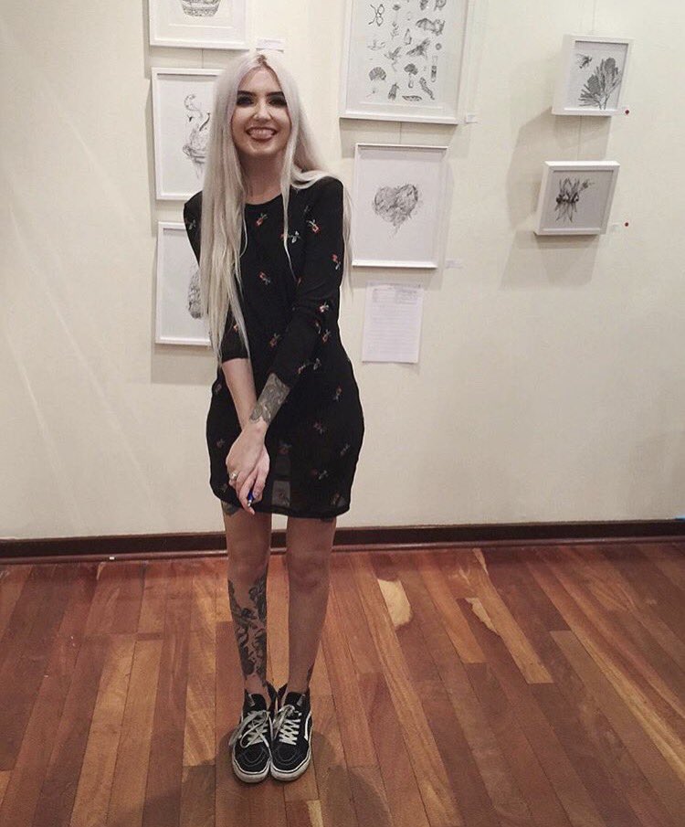 Not all girls can rock sneakers with dresses, but...