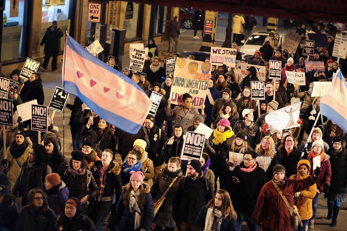 chicagotribune's tweet photo. A Trans Liberation protest in Chicago Friday drew nearly 1,000 people to rally in defense of transgender rights https://t.co/GajYuIuW80 https://t.co/fMRcILhu10
