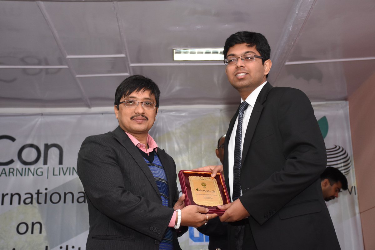 IIMShillong's tweet photo. Bhavya Rastogi @IIM_Shillong receives the First Prize for her Article, followed by Arnab Bhattacharya & Mahadeep Ray @IIMRanchi #SusCon2017 https://t.co/xS3RIwNNTJ